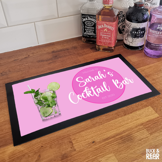 Personalised Cocktail Pink bar mat on a counter top