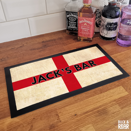 Personalised England bar mat on a counter top 