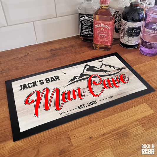 Personalised Man Cave bar mat on a counter top