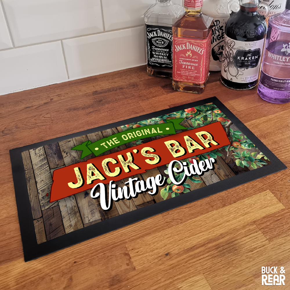Vintage Cider Personalised bar mat on a counter top