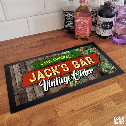 Vintage Cider Personalised bar mat on a counter top
