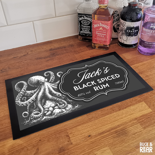 Personalised Kraken bar mat on a counter top
