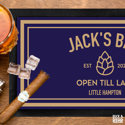 Close up of a bar mat personalised with a Pine Cone